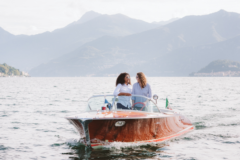 engagement photo shoot on a boat on lake como